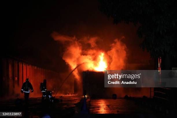 Firefighters still try to contain the fire caused by an explosion at a private Inland Container Depot in Sitakunda upazila in Chittagong, Bangladesh...