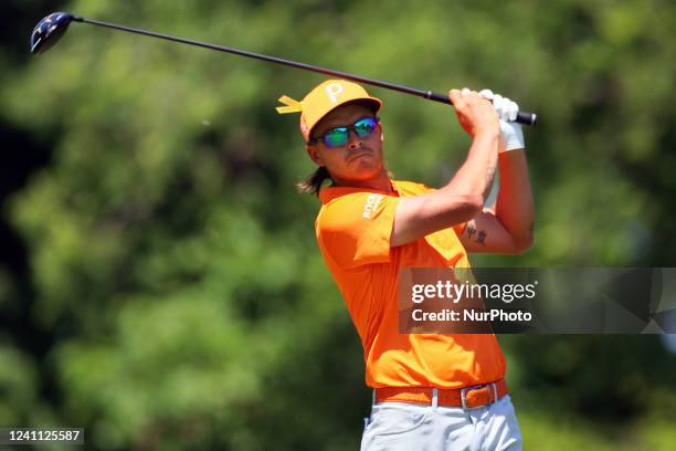 Rickie Fowler of the United States hits from the 18th tee during the final round of The Memorial Tournament presented by Workday at Muirfield Village...