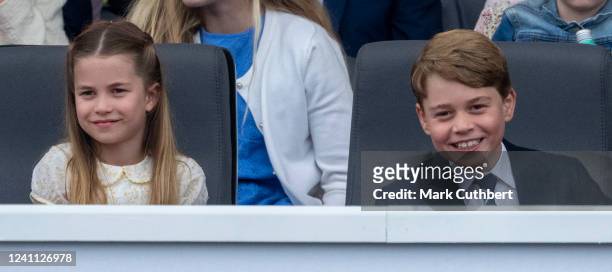 Prince George of Cambridge and Princess Charlotte of Cambridge attend the Platinum Pageant on The Mall on June 5, 2022 in London, England. The...