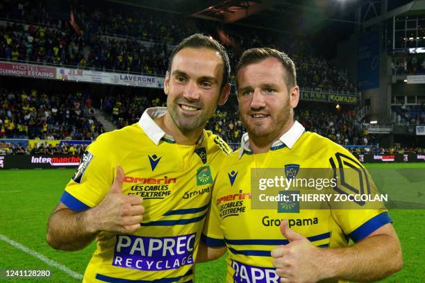 Clermont's French scrum-half Morgan Parra and Camille Lopez pose after winning the French Top14 rugby union match between Clermont and Montpellier at...