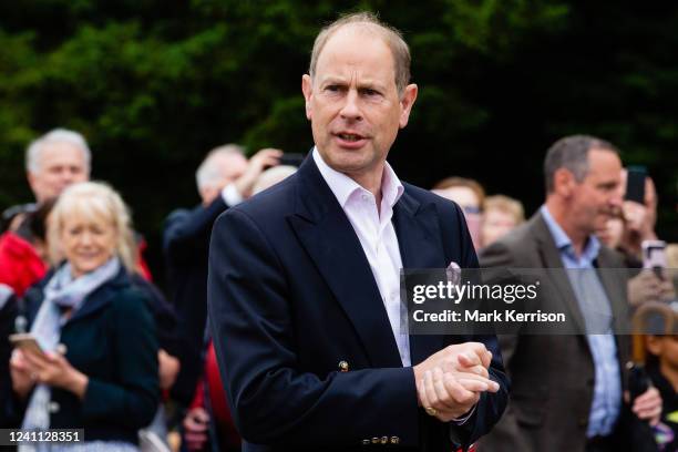 The Earl of Wessex arrives to greet local residents taking part in a Platinum Jubilee Big Lunch On The Long Walk in Windsor Great Park to mark Queen...