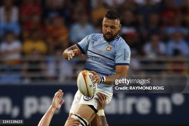 Perpignan's French flanker Damien Chouly grabs the ball in a line-out during the French Top14 rugby union match between USA Perpignan and...