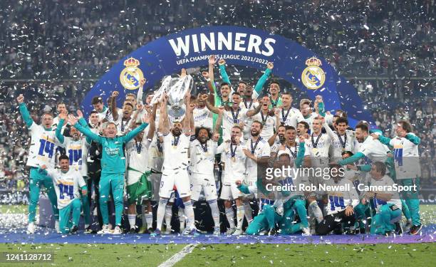 Winners Real Madrid as Karim Benzema lifts the trophy during the UEFA Champions League final match between Liverpool FC and Real Madrid at Stade de...