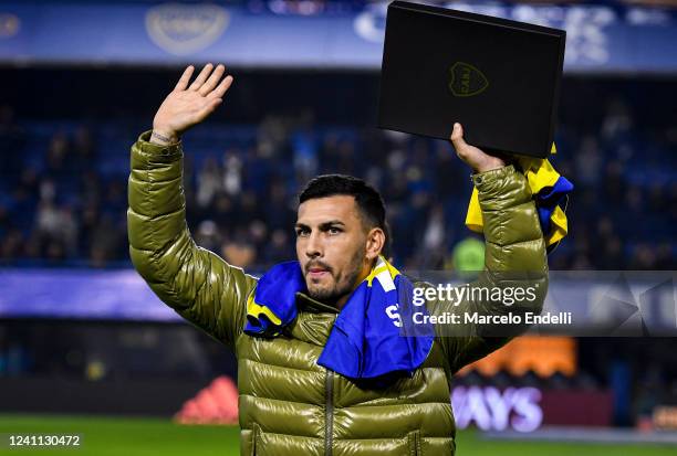 Former Boca Juniors player and now on Paris Saint-Germain Leandro Paredes greets the fans before a match between Boca Juniors and Arsenal as part of...