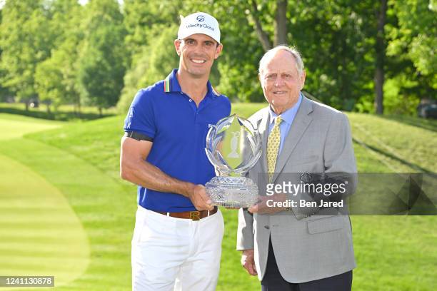 Billy Horschel and Jack Nicklaus stand with the trophy on the 18th green during the trophy presentation after the final round of the Memorial...