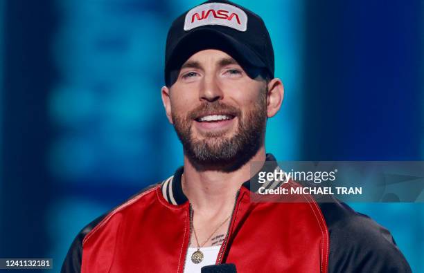 Actor Chris Evans speaks on stage during the MTV Movie and TV Awards at the Barker Hangar in Santa Monica, California, June 5, 2022.
