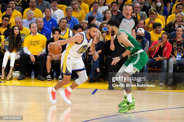 Stephen Curry of the Golden State Warriors dribbles the ball during Game Two of the 2022 NBA Finals against the Boston Celtics on June 5, 2022 at...