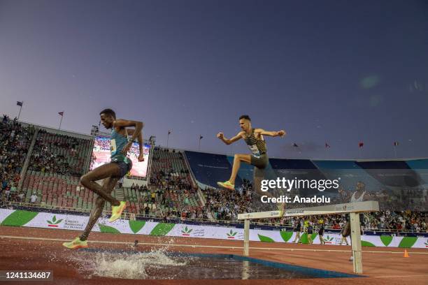 Soufiane El Bakkali ) of Morocco competes in men's 3000mt hurdle race during the Diamond League at the Moulay Abdellah Sports Complex, in Rabat,...