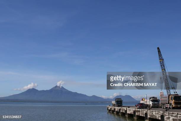 Smoke rises from Bulusan volcano as seen from Sorsogon City, Sorsogon province on June 6, 2022. - The volcano in the eastern Philippines spewed a...