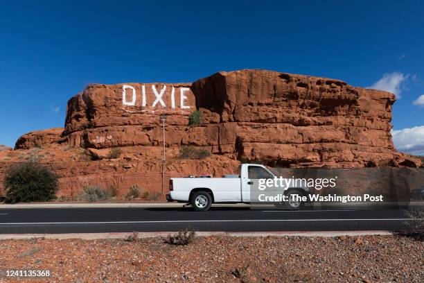 View of the Dixie Red Rock, sometimes called the sugarloaf, at Pioneer Park located above the city of St. George, UT on December 10, 2021.