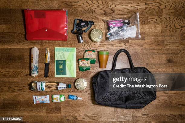 Contents of Kateryna Ponomarenko's emergency bag laid out on the floor of her apartment in Chernihiv, Ukraine on January 29, 2022. Kateryna, a mother...
