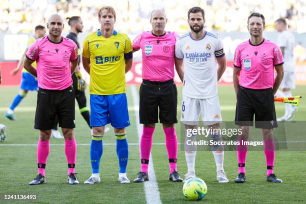 Alex Fernandez of Cadiz CF, referee Antonio Miguel Mateu Lahoz, Nacho Fernandez of Real Madrid during the La Liga Santander match between Cadiz FC v...