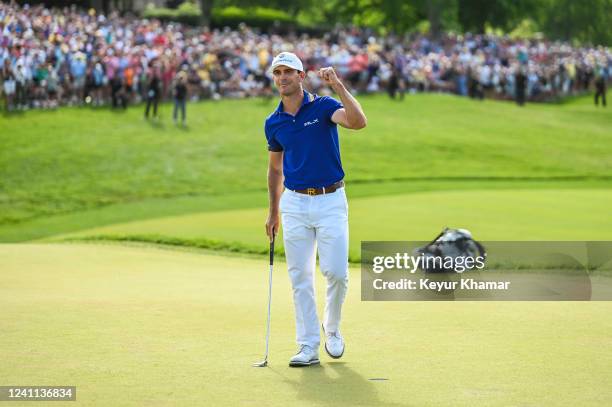 Billy Horschel celebrates with a fist pump after his four stroke victory on the 18th hole green during the final round of the Memorial Tournament...