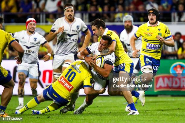 Arthur VINCENT of Montpellier and Jean Pascal BARRAQUE of Clermont and Camille LOPEZ of Clermont during the Top 14 match between Clermont and...