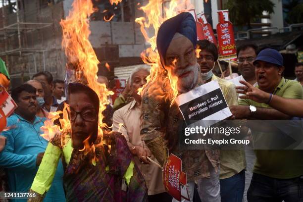 South Kolkata District Congress members take part during a demonstration against the increase in fuel price which is creating a miserable situation...