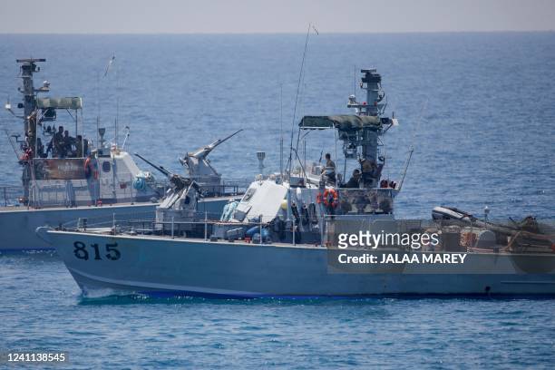 Israeli navy vessels are pictured off the coast of Rosh Hanikra, an area at the border between Israel and Lebanon , on June 6, 2022. - Tensioned...
