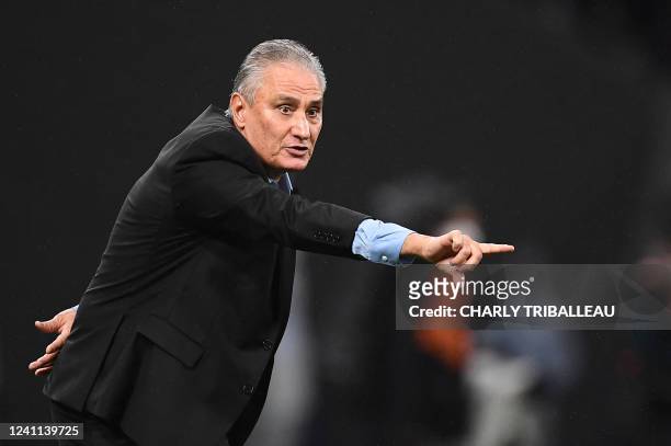 Brazil's head coach Tite gestures during the friendly football match between Japan and Brazil at the National Stadium in Tokyo on June 6, 2022.
