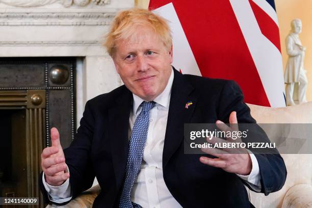 Britain's Prime Minister Boris Johnson gestures as he meets with Estonia's Prime Minister Kaja Kallas at the beginning of their meeting inside 10...