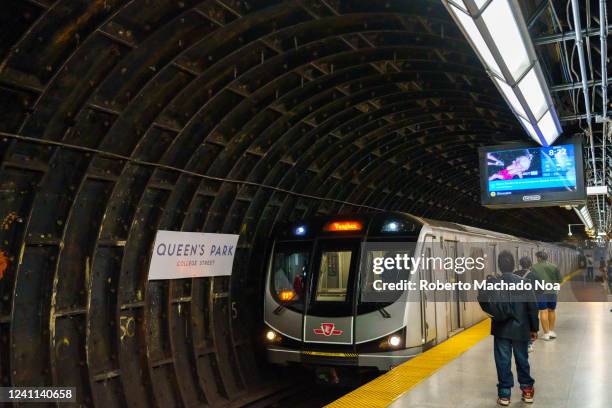 Bombardier subway train arrives at Queen's Park subway station.