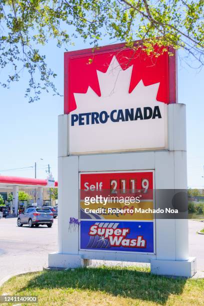 Petro-Canada gasoline price board showing a record 211.9 Canadian dollars per a little.