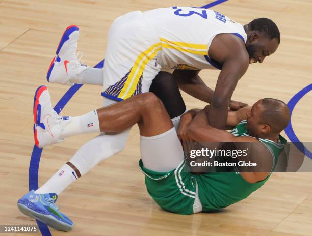 San Francisco Boston Celtics center Al Horford battles with Golden State Warriors forward Draymond Green ending in a jump ball during the first...