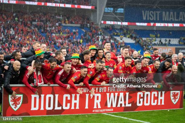 Players and staff of Wales celebrate during the 2022 FIFA World Cup Qualifier play-off Final match between Wales and Ukraine at Cardiff City Stadium...