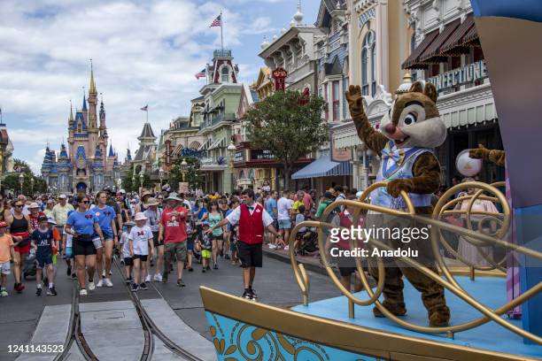 Chip and Dale waive to tourist at the end of a parade at the Magic Kingdom Park at Walt Disney World in Orange County, Florida on June 1, 2022. Walt...