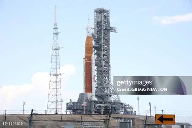 View of the massive Artemis I Space Launch System rocket and Orion spacecraft at Launch Pad 39B after rolling out from the Vehicle Assembly Building...