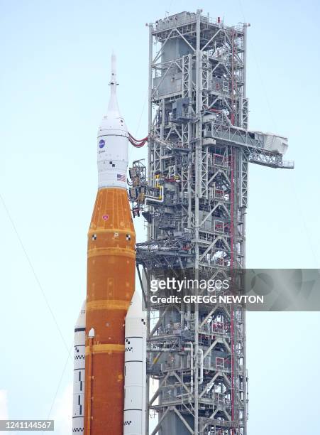 Close-up view showing the Orion spacecraft atop the massive Artemis I Space Launch System rocket at Launch Pad 39B after rolling out from the Vehicle...