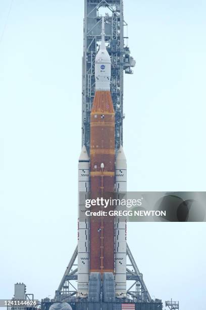 Close-up view of the massive Artemis I Space Launch System rocket and Orion spacecraft at Launch Pad 39B after rolling out from the Vehicle Assembly...