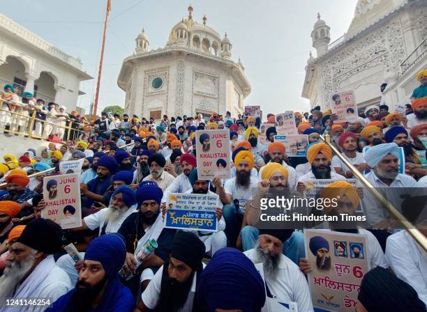 Members of various hardline Sikh organisations raise Pro-Khalistan slogans on the 38th anniversary of Operation Blue Star, at Golden Temple, on June...