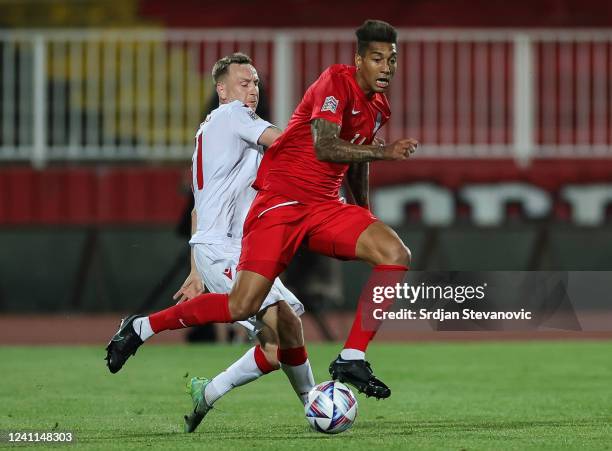 Eddy of Azerbaijan competes for the ball with Andrei Solovei of Belarus during the UEFA Nations League League C Group 3 match between Belarus and...