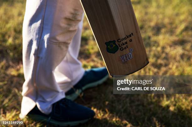 Detail of a bat held by an athlete from the Cricket Brazil professional womens in Poco de Caldas, Minas Gerais state, Brazil on May 24, 2022. - In a...