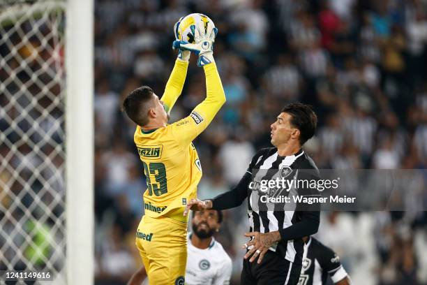 Tadeu goalkeeper of Goias jumps for the ball with Victor Cuesta of Botafogo during the match between Botafogo and Goias as part of Brasileirao Series...