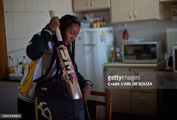 Lindsay Mariano Vilas Boas, from the Cricket Brazil professional womens team, prepares to leave her home for the training centre in Poco de Caldas,...
