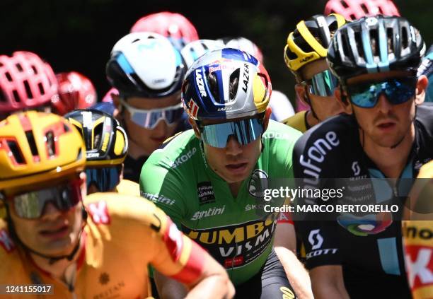 Green jersey of best sprinter Jumbo-Visma team's Belgian rider Wout Van Aert rides in the pack in the third stage of the 74th edition of the...