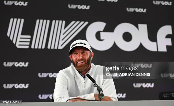 Golfer Dustin Johnson speaks during a press conference ahead of the forthcoming LIV Golf Invitational Series event at The Centurion Club in St...