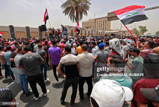 Iraqis protest against the governments employment policy near the parliament building in Baghdad's Green Zone on June 7, 2022. - The unemployment...