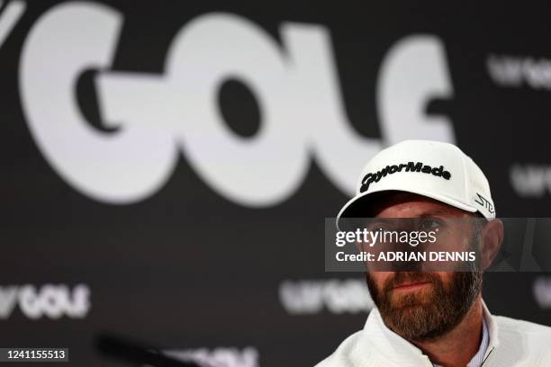 Golfer Dustin Johnson reacts during a press conference ahead of the forthcoming LIV Golf Invitational Series event at The Centurion Club in St...