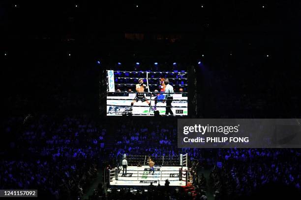 General view shows Japan's Naoya Inoue fighting against Philippines' Nonito Donaire during their Bantamweight unification boxing match at Saitama...