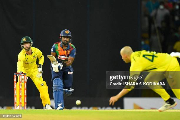Sri Lanka's Charith Asalanka plays a shot during the first Twenty20 international cricket match between Sri Lanka and Australia at the R. Premadasa...