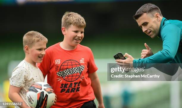 Dublin , Ireland - 7 June 2022; Republic of Ireland's Seamus Coleman video calls his Everton club-mate Vitaliy Mykolenko, to speak to Ukrainian...