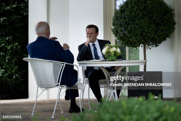 President Joe Biden and Sen. Chris Murphy talk outside the Oval Office before a meeting at the White House about gun control reform June 7 in...