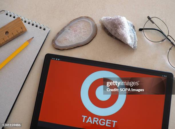 Target Corp. Design In this photo illustration Target Corporation logo seen displayed on ...