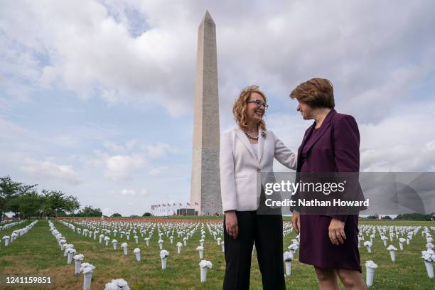 Former Rep. Gabby Giffords , who resigned from Congress due to a traumatic brain injury suffered during an assassination attempt, greets Sen. Amy...