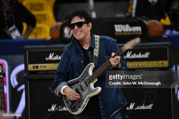 Finals: Guitarist Neal Schon of Journey performs the national anthem before the Golden State Warriors vs Boston Celtics game at Chase Center. Game 1....