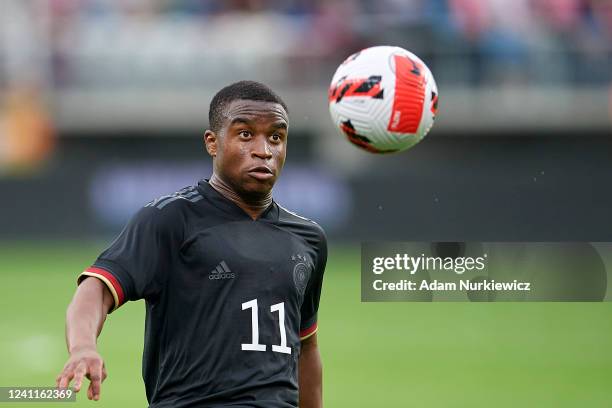 Youssoufa Moukoko from U21 Germany controls the ball during the UEFA European Under-21 Championship Qualifier Group B match between Poland U21 and...