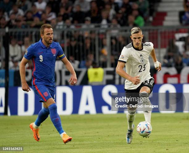 Harry Kane of England, Nico Schlotterbeck of Germany during the UEFA Nations League League A Group 3 match between Germany and England at Allianz...