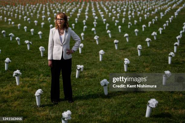 Former Rep. Gabrielle Giffords walks through Giffords Gun Violence Memorial in front of the Washington Monument on Tuesday, June 7, 2022 in...