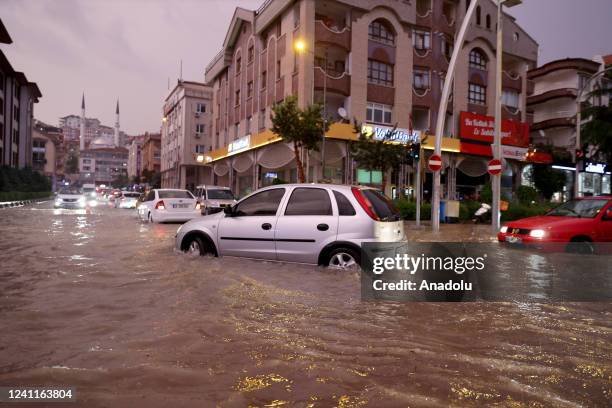 Drivers face slashing rains and flooded streets that disrupted the city in Ankara, Turkiye on June 07, 2022. After the heavy rain, which negatively...
